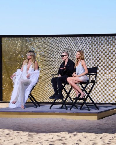 Heidi Klum in white sheer cover-up and crochet dress.