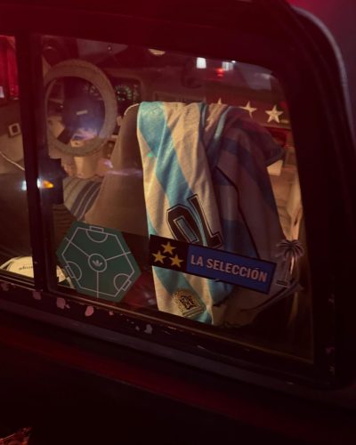 Hoyeon Jung showcases a blue jersey with a stylish black skirt.