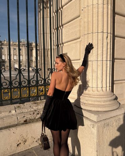 Ilona Arsentieva stylish black gown with long, fitted gloves