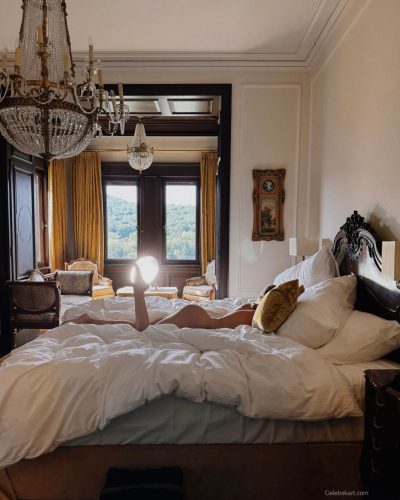 Ilona Arsentieva black lace dress accentuating her figure