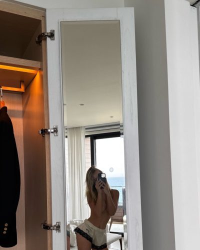 Ilona Arsentieva black gown with feminine lace accents