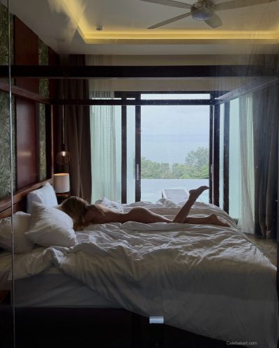 Ilona Arsentieva black gown with feminine lace accents