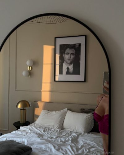 Ilona Arsentieva black jumpsuit with elegant lace features