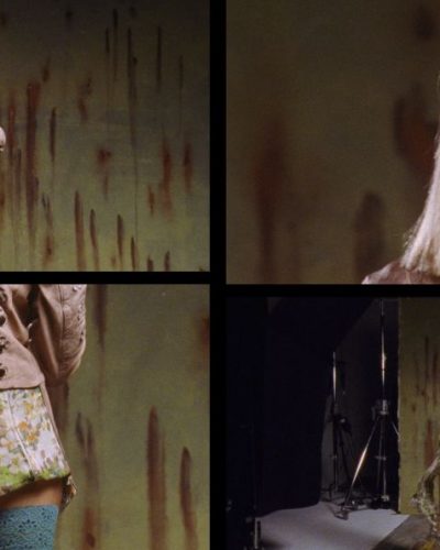 Iris Law in a floral skirt with contrasting pink jacket.