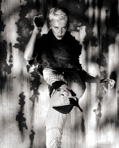 Iris Law sports a vibrant floral print skirt and jacket.