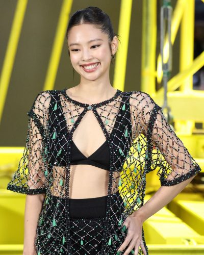 Jennie Kim modern sheer dress with intricate beadwork and black