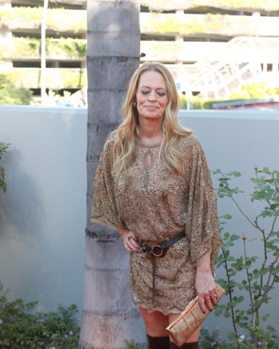 Jeri Ryan in beige beaded dress with keyhole cutout