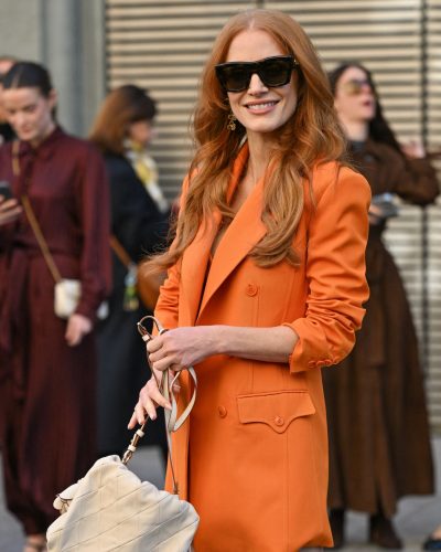 Jessica Chastain tailored orange blazer and shorts ensemble