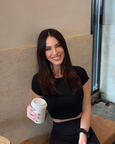 Jessica Lowndes black crop top with leggings and white coffee cup