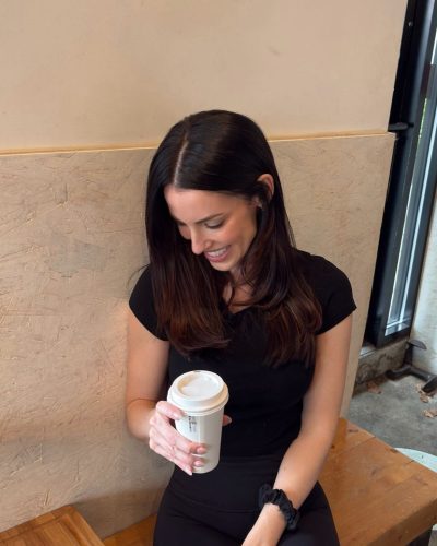 Jessica Lowndes tailored black crop top with sleek black leggings