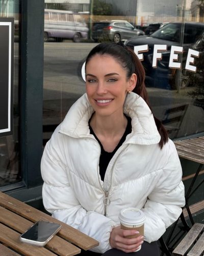 Jessica Lowndes black crop top with leggings and white coffee cup