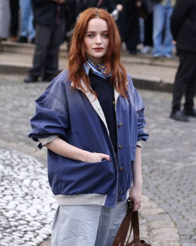 Joey King casual blue jacket styled with gray trousers