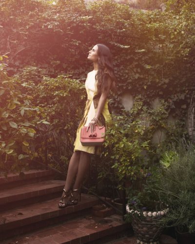 Jordana Brewster in a sleek gown with shimmering accessories