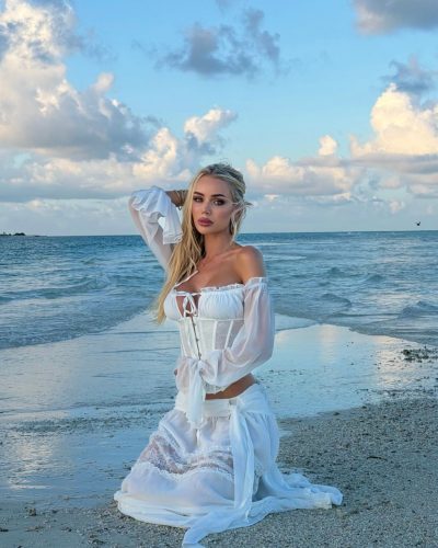 Julia Cavanagh with long hair cascading over shoulders