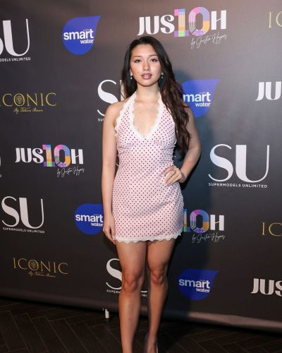 Julia Garcia wearing pink dress at appearance 2023