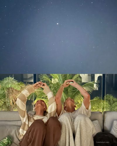 Kari Riley with a playful bikini and layered beach accessories.