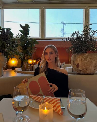 Kari Riley in a bold geometric bikini enjoying the summer sun.