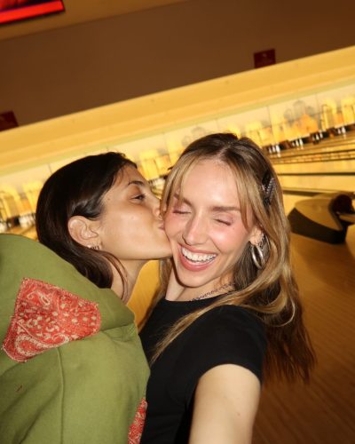 Kari Riley in a lively bikini complemented by beach vibes.