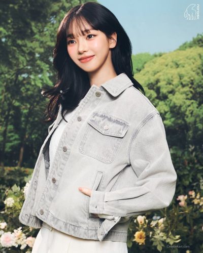 Karina in a breathable white ensemble with stylish trousers