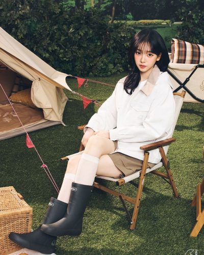 Karina in a light and airy white jumpsuit