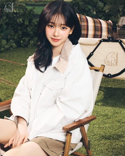 Karina wearing a light white ensemble perfect for spring