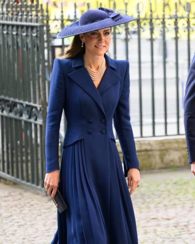 Kate Middleton elegant navy coat dress featuring structured silhouette