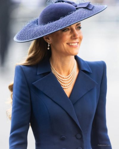 Kate Middleton layered pearl necklaces enhancing navy dress
