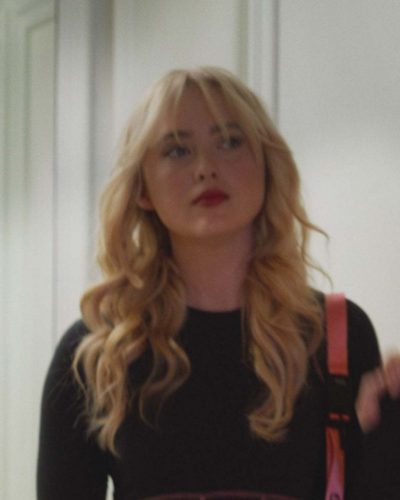 Kathryn Newton high-waisted white golf shorts for sporty style