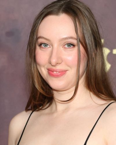 Kitty Hawthorne minimalistic neckline accentuating her collarbone.