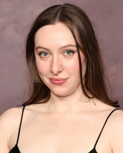 Kitty Hawthorne light blush creating a radiant glow.