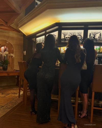 Komal Ilsanker in white dress with playful clutch interaction