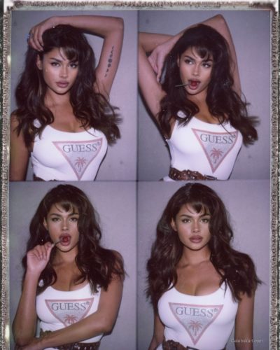 Komal Ilsanker in flowing white gown with intricate detailing