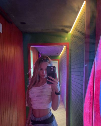 Kyla Dodds in floral print bikini with navy and white colors