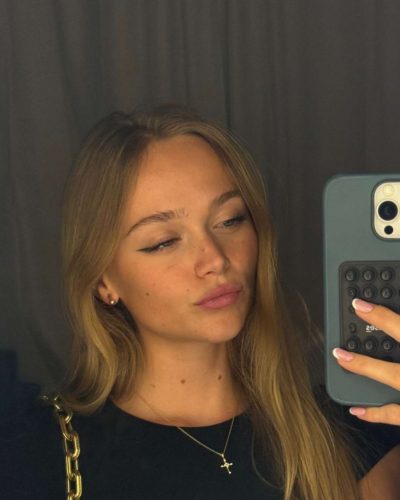 Kyla Dodds in floral print bikini with navy and white colors