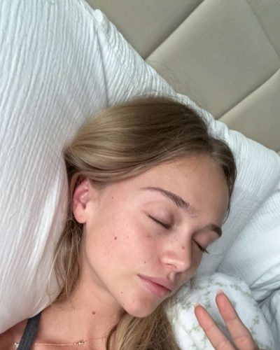 Kyla Dodds in colorful floral bikini enjoying summer vibes