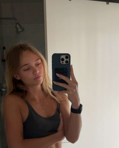 Kyla Dodds in stylish floral bikini and sunglasses