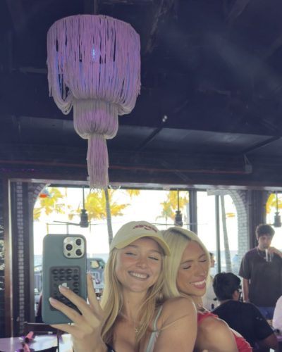 Kyla Dodds in colorful floral bikini enjoying summer vibes