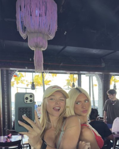 Kyla Dodds in bright floral bikini with sun-kissed skin