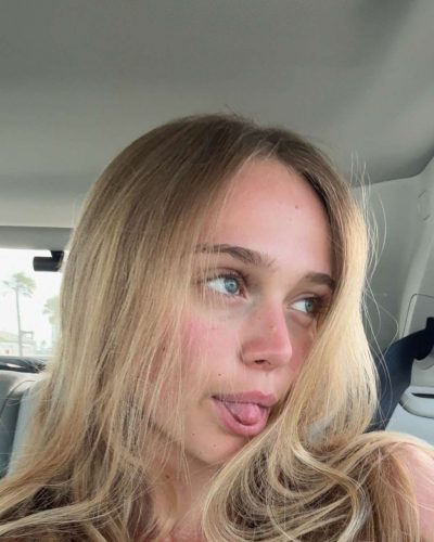 Kyla Dodds wearing red bikini with denim shorts