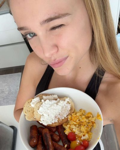 Kyla Dodds black strapless top and playful denim jeans