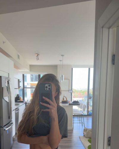 Kyla Dodds wearing pink bandeau top with shorts