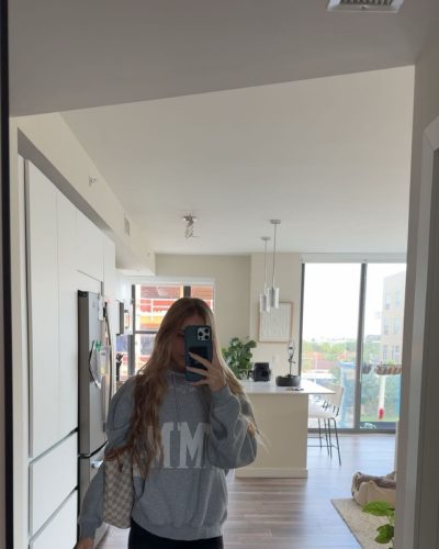 Kyla Dodds comfortable gray shorts and crop top ensemble