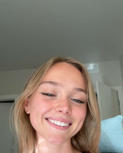 Kyla Dodds in comfortable black tank and stylish shorts.