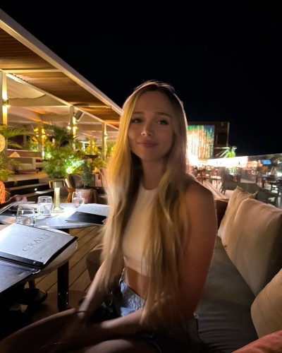 Kyla Dodds in stylish brown bikini with stripes.