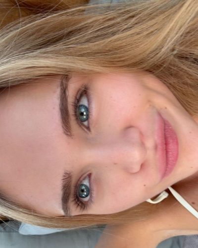 Kyla Dodds in lightweight sheer cover-up over bikini.