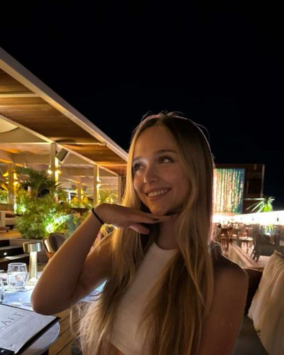 Kyla Dodds in trendy sheer cover-up and bikini combo.