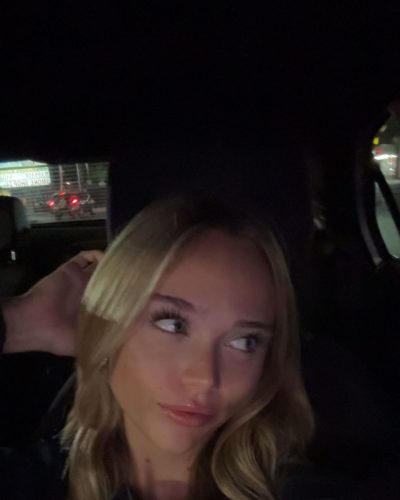 Kyla Dodds dressed in black racerback and tailored blue shorts