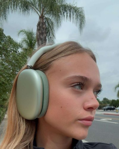 Kyla Dodds in black racerback top and blue shorts