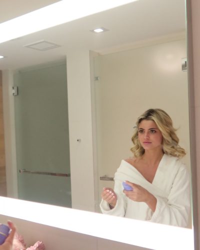 Kylan Darnell black floral bikini complemented by a straw hat