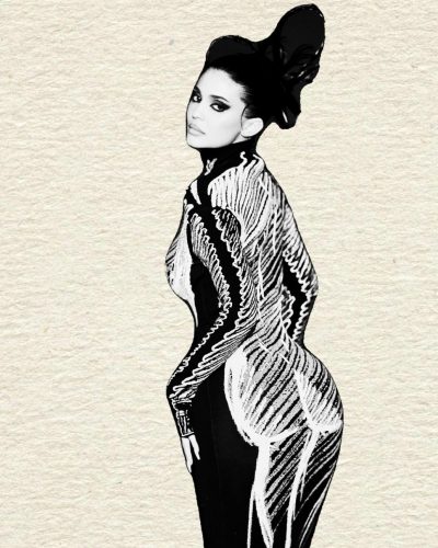 Kylie Jenner in eye-catching yellow coat with dark background